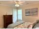 Bedroom with a dresser, a window, and artwork at 312 Shelly Bay Ct., Surfside Beach, SC 29575