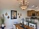Cozy dining area with stylish accents and kitchen access at 312 Shelly Bay Ct., Surfside Beach, SC 29575