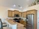 Updated kitchen boasts stainless steel appliances and breakfast bar at 312 Shelly Bay Ct., Surfside Beach, SC 29575