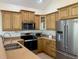 Well-lit kitchen with stainless steel appliances and ample storage at 312 Shelly Bay Ct., Surfside Beach, SC 29575