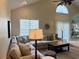 Comfortable living room with sectional sofa and natural light at 312 Shelly Bay Ct., Surfside Beach, SC 29575