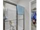 Accessible shower with seating, grab bars, and a convenient walk-in closet at 315 Bulkhead Bend # 315, Carolina Shores, NC 28467