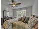 Bedroom with soft carpet, ceiling fan, and window view at 315 Bulkhead Bend # 315, Carolina Shores, NC 28467