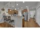 Modern kitchen with stainless steel appliances, granite countertops, a breakfast bar and seamless flow to other rooms at 315 Bulkhead Bend # 315, Carolina Shores, NC 28467