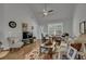 Comfortable living room featuring a floral rug, ceiling fan, and lots of natural light at 315 Bulkhead Bend # 315, Carolina Shores, NC 28467