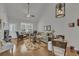 Inviting living room with vaulted ceilings, plush seating, and a charming floral rug at 315 Bulkhead Bend # 315, Carolina Shores, NC 28467