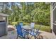 Patio with comfortable seating area and view of the lush greenery at 315 Bulkhead Bend # 315, Carolina Shores, NC 28467