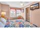 This cozy bedroom offers a bright window view, television, and access to an adjoining bathroom at 329 54Th Ave. N, North Myrtle Beach, SC 29582