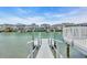 The waterfront backyard has a private dock, perfect for boating and enjoying the water at 329 54Th Ave. N, North Myrtle Beach, SC 29582