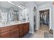 The bathroom boasts a double sink vanity and a walk-in closet at 408 Capua Ct., Myrtle Beach, SC 29588