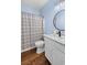 Bathroom featuring a vanity with marble countertops, and a shower and toilet with light blue paint at 409 Cypress View Ave., Little River, SC 29566