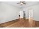 Bedroom boasts hardwood floors, closet, and an en-suite bathroom, offering both style and functionality at 409 Cypress View Ave., Little River, SC 29566
