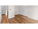 Bedroom featuring hardwood floors, closet and multiple entry points at 409 Cypress View Ave., Little River, SC 29566