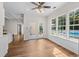Bright dining area featuring poolside views and wood flooring at 409 Cypress View Ave., Little River, SC 29566