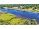 Stunning aerial view of a waterway, golf course, and lush landscape, showcasing the community's beauty at 4400 Turtle Ln. # 2-D, Little River, SC 29566