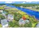 Fantastic aerial view features a waterfront community surrounded by trees and a golf course at 4400 Turtle Ln. # 2-D, Little River, SC 29566