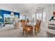 Bright and open dining area features large windows and views of the waterway at 4400 Turtle Ln. # 2-D, Little River, SC 29566