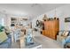 Inviting living space with lots of seating, nautical decor, and dining room access at 4400 Turtle Ln. # 2-D, Little River, SC 29566