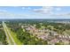Overhead shot of community with a golf course, highway, and lush trees, offering scenic views at 4683 Wild Iris Dr. # 103, Myrtle Beach, SC 29577