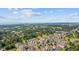 Scenic aerial view of property, showcasing surrounding landscape, golf course, and distant ocean views at 4683 Wild Iris Dr. # 103, Myrtle Beach, SC 29577