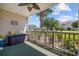 Relaxing patio with comfortable seating, ceiling fan, and picturesque views of well-manicured green spaces at 4683 Wild Iris Dr. # 103, Myrtle Beach, SC 29577
