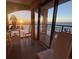 Picturesque balcony with seating offers stunning sunset views over the ocean at 4800 S Ocean Blvd. # 706, North Myrtle Beach, SC 29582