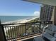 Unwind on this inviting balcony, offering stunning views of the ocean and resort amenities for relaxation at 4800 S Ocean Blvd. # 706, North Myrtle Beach, SC 29582