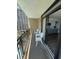 Charming balcony offering partial views of the pool and kitchen, creating a delightful indoor-outdoor living experience at 4800 S Ocean Blvd. # 706, North Myrtle Beach, SC 29582