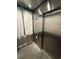 Modern elevator with stainless steel finish and digital display offers an efficient transportation solution within the building at 4800 S Ocean Blvd. # 706, North Myrtle Beach, SC 29582