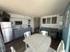 Modern kitchen open to living area; ample counter space and stainless steel appliances at 4800 S Ocean Blvd. # 706, North Myrtle Beach, SC 29582