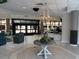 Welcoming lobby featuring a decorative table, elegant lighting, and comfortable seating, creating a warm ambiance at 4800 S Ocean Blvd. # 706, North Myrtle Beach, SC 29582