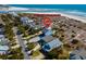 Aerial view of coastal homes near the beach, highlighting community beach house access at 52 Trimmings Ct., Pawleys Island, SC 29585