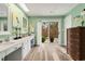 Spacious bathroom with dual vanity, walk-out access to private courtyard, and stylish design at 52 Trimmings Ct., Pawleys Island, SC 29585