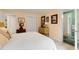 Comfortable bedroom featuring natural light and an ensuite bathroom, with a relaxing color palette at 52 Trimmings Ct., Pawleys Island, SC 29585