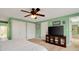 Inviting bedroom with ceiling fan, television on display, and generous closet space at 52 Trimmings Ct., Pawleys Island, SC 29585