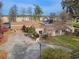 Stunning single-story house featuring an expansive driveway and a basketball hoop at 52 Trimmings Ct., Pawleys Island, SC 29585