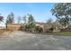Well-kept single-story home featuring a wide driveway and serene surroundings at 52 Trimmings Ct., Pawleys Island, SC 29585