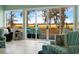 Cozy living room with sliding doors, comfortable seating, and a view of the outdoor patio at 52 Trimmings Ct., Pawleys Island, SC 29585