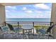 Oceanfront balcony offers stunning views with ample seating to enjoy the beach at 5523 N Ocean Blvd. # 1412, Myrtle Beach, SC 29577