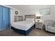 Comfortable bedroom with beachy decor and a queen-sized bed for a restful retreat at 5523 N Ocean Blvd. # 1412, Myrtle Beach, SC 29577