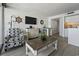 A spacious living room features decor and transitions into the kitchen area at 5523 N Ocean Blvd. # 1412, Myrtle Beach, SC 29577
