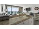 A living room features granite countertops, balcony access, and an ocean view at 5523 N Ocean Blvd. # 1412, Myrtle Beach, SC 29577