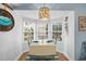 Charming dining nook with large windows providing natural light and beadboard walls at 6001 - 1040 S Kings Hwy., Myrtle Beach, SC 29575