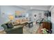 Cozy living room with comfortable seating, beach-themed décor, and light blue walls at 6001 - 1040 S Kings Hwy., Myrtle Beach, SC 29575