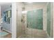 Modern shower with glass door and decorative tile accent for a spa-like experience at 6001 - 1040 S Kings Hwy., Myrtle Beach, SC 29575