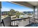 Enjoy the community view from this covered balcony, complete with comfortable outdoor seating at 6001 N Ocean Blvd. # 137, North Myrtle Beach, SC 29582