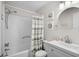 Clean bathroom with a shower and tub combination, stylish mirror, and ample lighting at 6001 N Ocean Blvd. # 137, North Myrtle Beach, SC 29582