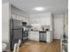 Well-lit kitchen with stainless steel appliances, granite counters, and white cabinets at 6001 N Ocean Blvd. # 137, North Myrtle Beach, SC 29582
