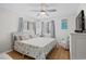 Cozy main bedroom with nautical decor and ample natural light at 6001 N Ocean Blvd. # 137, North Myrtle Beach, SC 29582