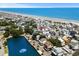 Breathtaking aerial view captures the oceanfront homes near the shore and blue lake at 6001-1010 S Kings Highway, Myrtle Beach, SC 29575